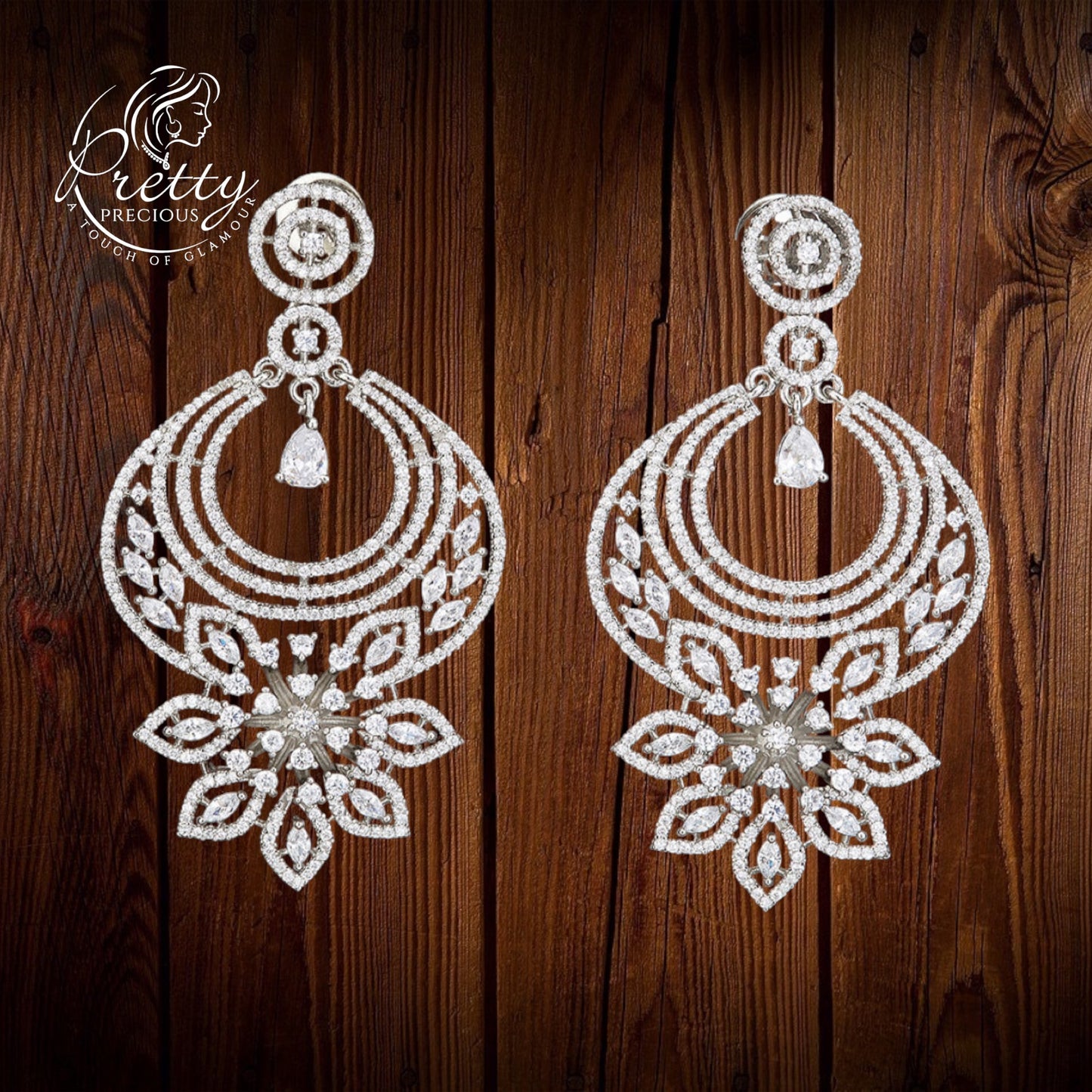 422161 American Diamond Chand Earring